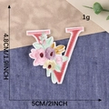 Floral letter V embroidered iron-on patch with pink flowers for garment decor - Letter V / Hot Melt Adhesive