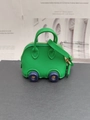 Mini car-shaped crossbody bag in vibrant green litchi grain faux leather with wheels - Green