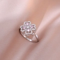 Macro detail of silver adjustable clover ring with pink and white cubic zirconia - Steel Color Pink Rotating Ring (J0153)