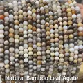 Macro detail of natural bamboo leaf agate round beads with unique organic textures - Natural Bamboo Leaf Agate 4mm (Approx. 90pcs) Strand