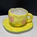 Hand-pinched yellow ceramic coffee cup and saucer set with pink tulip patterns - Tulip Cup & Saucer