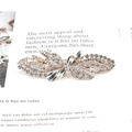 Sparkling gold butterfly hair clip with clear rhinestones on vintage script background - Forest Flower White