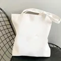 Minimalist white cotton canvas tote bag on chair for daily shopping and travel - Blank White Tote