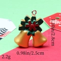 Close-up of resin Christmas bell pendants with holly berries and size specifications - 5# Gold Double Bells