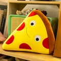 Cute plush pizza slice pillow with smiling face on a wooden shelf in a cozy setting - 30 cm / Pizza