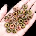 Polished Unakite stone abacus beads with large holes held in hand on dark background - 6x12mm Unakite (Single)