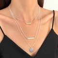 Three-layer silver necklace with pearls, horizontal bar and hammered disk pendant on model - Silver Three-Layer Artificial Pearl Bar & Round Disc Pendant Style (Bright Silver 0232)