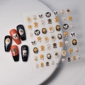 Macro detail of 3D embossed nail stickers featuring vintage gold and black roses - Golden Black Rose Bow Style (CO-070)