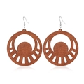 Detailed view of hollowed-out wooden drop earrings featuring sun and moon patterns - Style 54