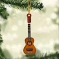 Macro detail of custom guitar ornament with Mark name hanging on green pine branch - Brown Shiny