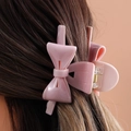 Elegante roze haarklem in strikvorm met glanzende afwerking voor een Franse vintage look - H474 / Glinsterend Roze
