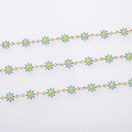 Detail of blue and yellow daisy flower link chain with 18k gold plating finish - Gold + Lake Blue