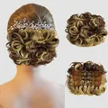 Detail showing the inner hair comb attachment of this brown and blonde messy bun hairpiece - 22T10# (Light Blonde Mix)