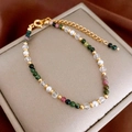 Detailed view of colorful gemstone beads and gold lobster clasp on an elegant necklace - 27# Necklace-Gold Green Semi-precious Stone Style