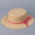 Détail macro de la texture en raphia et du ruban fuchsia sur ce chapeau de soleil - M(56-58cm) / Rouge Rose