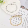 Delicate stainless steel bracelet set with zircon stones in gold and silver finishes - Oval Style (Gold 001)