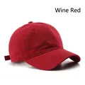 Classic wine red cotton baseball cap with adjustable strap and curved brim design - Adjustable / Burgundy