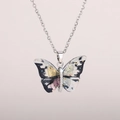 Detail of butterfly pendant with black and white artistic paint and sparkling crystals - Silver Chain-Ink Phantom