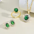 Vintage gold-plated jewelry set with emerald green stones and zircon accents - Jewelry Set / Gold