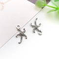 Starfish shaped antique silver alloy pendant for DIY jewelry making on white background - 12x18mm Marine Starfish Style C