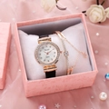 Elegant women's watch set with rhinestone bezel, shell dial and matching star bracelet - Black And Bracelet And Box