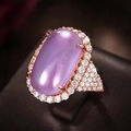 Luxurious rose gold ring with large oval purple gemstone and shimmering diamond halo - US 7 / Rose Gold