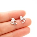 Detailed close-up of a long-haired girl silhouette earring in polished silver steel - Steel