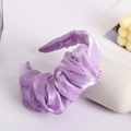 Detailed view of purple satin twisted headband featuring sparkling rhinestone embellishments - Purple Rhinestone Bubble Pleats