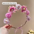 Detail showing the 18.5cm diameter of this floral crown with purple ribbon ties - Purple Floral Wreath