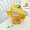 Detail of yellow kids sun visor featuring cartoon dinosaur prints and a whistle strap - 52-54cm (3-8 Years) / Yellow