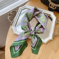Floral paisley silk scarf in purple and green mix displayed on a silver tray - Purple Rose