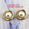 Vintage gold matte metal earrings with Baroque pearls on marble surface - 0333/Gold Spiral Texture Pearl Studs