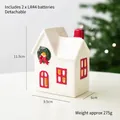 White ceramic light-up Christmas house with red chimney and green festive wreath - Large Red Villa