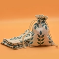 Cotton linen drawstring gift bags with green leaf print in a multi-piece set bundle - Blue Leaves
