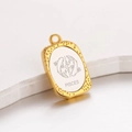 Golden and silver Pisces zodiac pendant necklace accessory with engraved fish design - Pisces