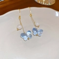 Macro shot of elegant butterfly earrings with blue glass and translucent opal beads - 8# Ear Hook-Blue-Butterfly