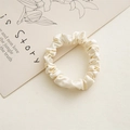 Elegant cream satin scrunchie with a glossy silk finish and elastic hair tie design - 6cm Satin Beige