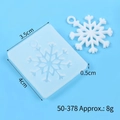 Macro view of snowflake silicone mold and finished resin pendant on blue background - 50-378-D/Snowflake / White