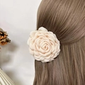 Elegant beige fabric rose hair claw clip shown on model for a graceful hairstyle - 12cm / Light Beige