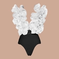 Detail of white ruffle trim and deep V-neckline on black high-waisted swimsuit - Black and White Swimsuit