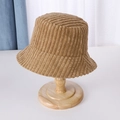 Close-up of khaki corduroy bucket hat texture on a wooden stand for winter - M (56-58cm) / Khaki