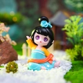 Cute panda figurine in traditional Chinese hanfu clothing sitting in a garden - Style 20B Waving Hand