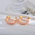 Chic triple-layered pink enamel hoop earrings with elegant gold metal finish - Pink