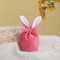 Close-up of pink velvet Easter bunny bag with long ears and silky drawstring ribbon detail - Large / Hot Pink
