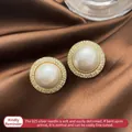Elegant gold-tone circular pearl stud earrings with zircon halo and 925 silver needles - Gold Circle Pearl