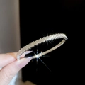 Macro view of silver color heart buckle bangle with micro-paved zircons on black background - Silver (Full Drill Circle)