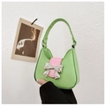 Mini lime green PU leather crossbody bag with pink trim and silver bow accessory - Green