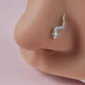 Close-up of silver snake-shaped nose stud with blue turquoise stones on nose wing - Blue Snake