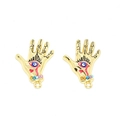 Detail of gold Hamsa hand charms with evil eye design and colored rhinestones for DIY jewelry - Hamsa Hand / Gold Red