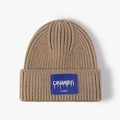 Gorro de punto caqui de invierno con parche azul y diseño de textura acanalada - Talla única / Caqui
